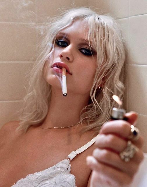 Women Smoking Cigarettes — 28