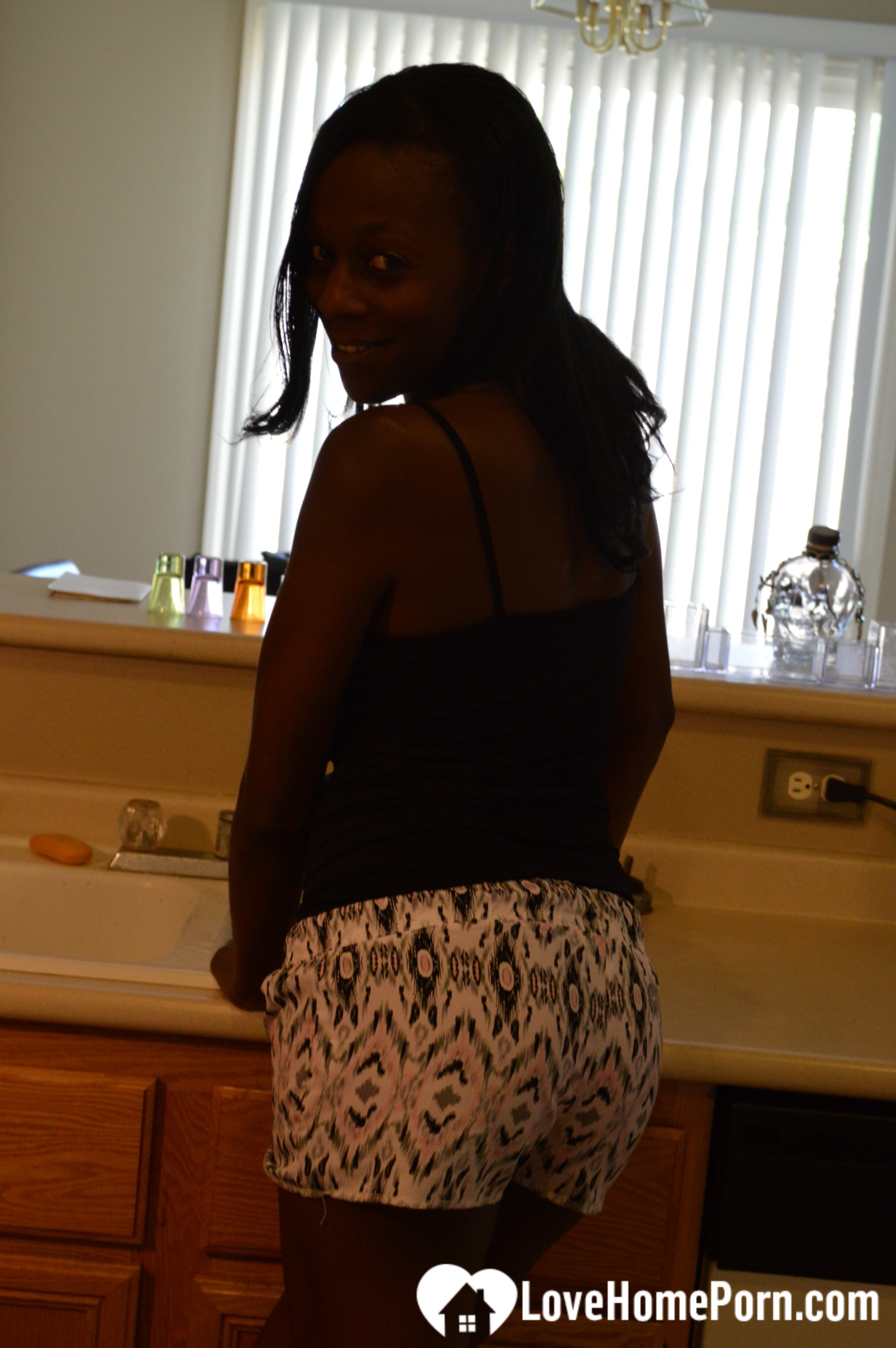 Ebony woman shows off both sides of her — 27
